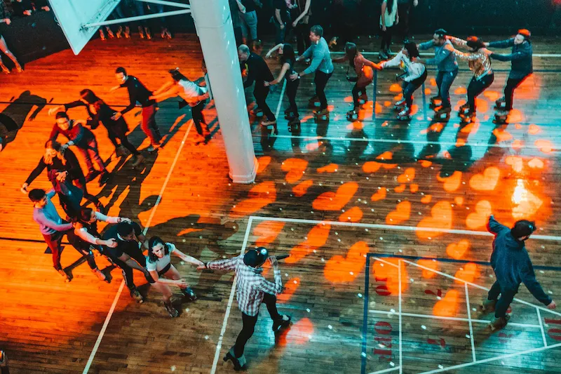 Osiris skating, leading a large group of people.